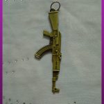 پلاک تفنگ طلایی
