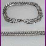 دستبند کارتیه نقره ای استیل