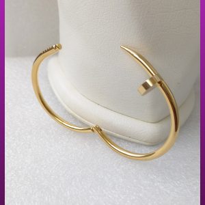 دستبند کارتیه میخ طلایی استیل