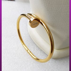 دستبند کارتیه میخ طلایی استیل