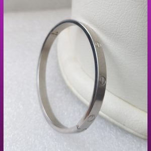 دستبند کارتیه پیچ نقره ای استیل