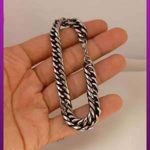 دستبند کارتیه سیاه قلم نقره ای استیل