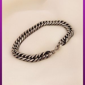 دستبند کارتیه سیاه قلم نقره ای استیل