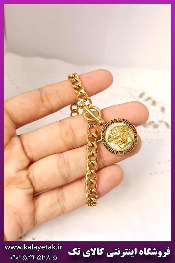 دستبند ورساچه صدفی طلایی با قفل تی استیل