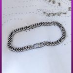 دستبند کارتیه مکعبی نقره ای با قفل طوطی لوگودار استیل