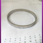 دستبند کارتیه نقره ای تاشو النگویی استیل