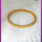 دستبند کارتیه طلایی تاشو النگویی استیل
