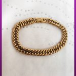 دستبند کارتیه ژاپنی طلایی قفل کتابی لوگو دار استیل
