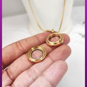 گردنبند قاب شیشه ای کوچک شفاف بازشو طلایی استیل